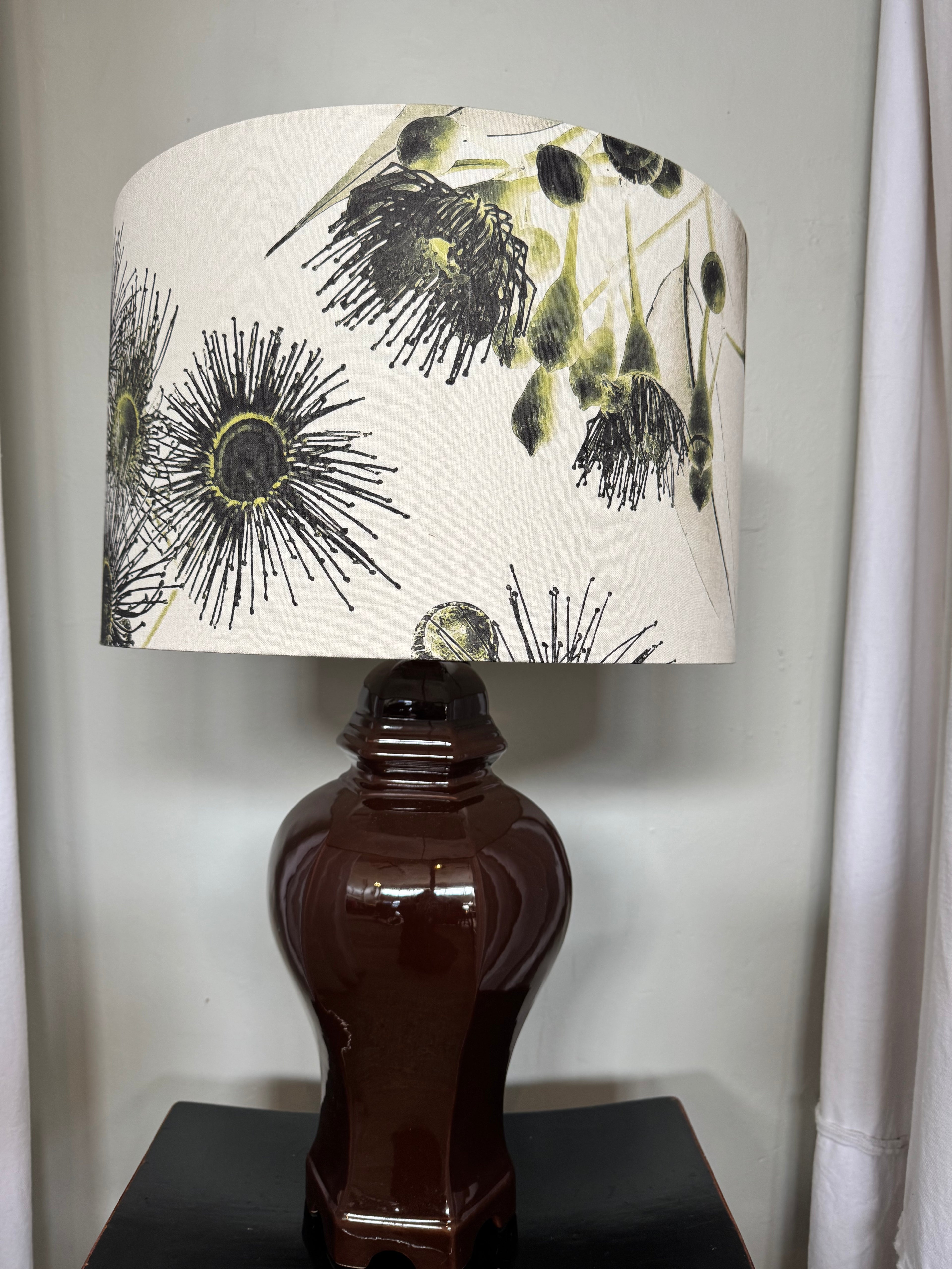 LAMP tall brown base with Kalypto Gilded shade.