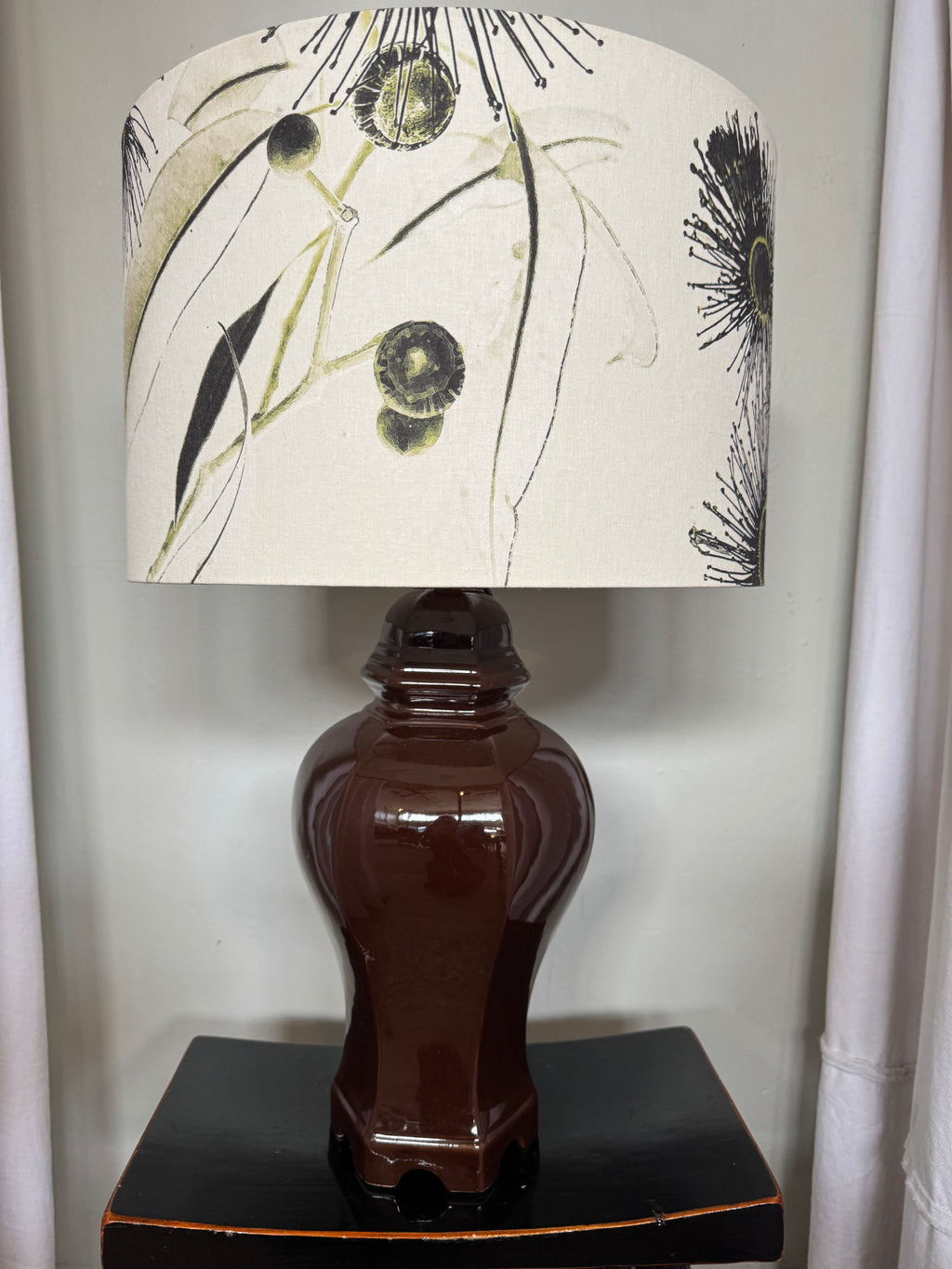 LAMP tall brown base with Kalypto Gilded shade.
